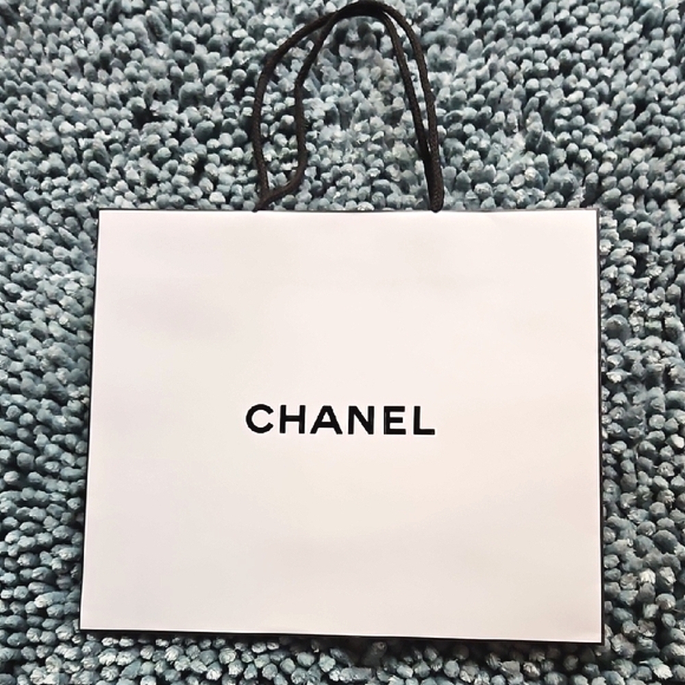CHANEL Classic White Bag with Black Logo